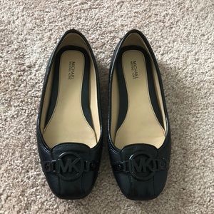 Micheak Kors flats.